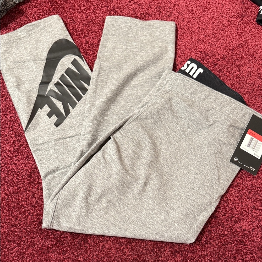 NWT Nike Light Gray Joggers with Black Swoosh size large